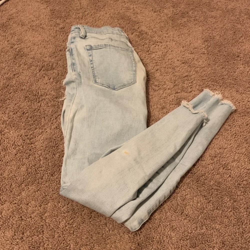 Passing light blue jeans